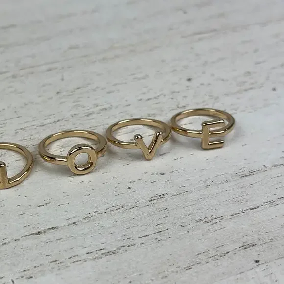 💕 NWOT Gold Tone L O V E Midi Ring Set Size 3 - 3.5 LOVE Stacking Rings - Picture 13 of 14